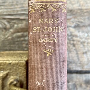 Affordable reading copy (c. 1900) antique book &quot;Mary St. John: A Novel&quot; by Rosa Nouchette Carey; set in 19th century London; imperfect
