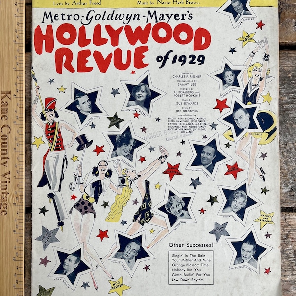 Fun and bright antique MGM's "Hollywood Revue of 1929" sheet music, original "Singin' In The Rain" with images of Buster Keaton, Jack Benny