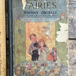 Messy antique 1919 printing of "Friendly Fairies" by Johnny Gruelle (author of Raggedy Ann) colored all over by a child; use for art project