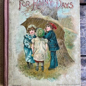 Niesamowite ilustracje! Antyczna książka dla dzieci z 1898 r. „For Rainy Days: Indoor Stories for Little People” zabawki psy koty natura szkoła ogrody
