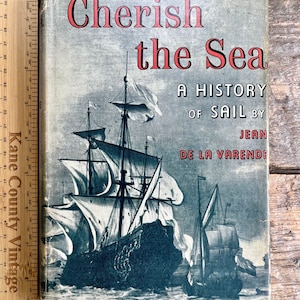 Vintage (1956) book with dust jacket &quot;Cherish the Sea: A History of Sail&quot; by Jean de la Varende; navigation Egypt Rome Vikings Spain France