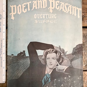 May include: A vintage sheet music cover for the overture "Poet and Peasant" by Suppe. The cover features a woman in a black dress with a blue scarf, lying in a field of flowers. The text "Poet and Peasant" is in a large, decorative font.