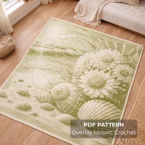 May include: A rectangular green and white rug with a seashell and floral design. The rug features a detailed pattern of seashells, flowers, and sand. The text "PDF PATTERN Overlay Mosaic Crochet" is visible on the rug.