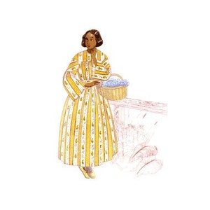 May include: A woman in a yellow and white striped dress holds a basket of blue flowers. She is standing next to a wooden table.