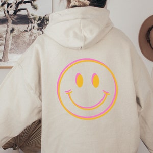 Cheery Vibes Hoodie, Happy Face Aesthetic Hoodie, Smiley Face Hooded Sweatshirt, Oversized Hoodie with Retro Smile Face Printed on the Back