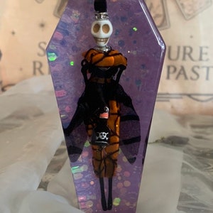 Coffin With Skeleton Figurine