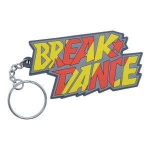 May include: A gray keychain with the words "BREAK DANCE" in yellow and red block letters. The keychain has a silver metal ring and chain. The design is outlined in gray.