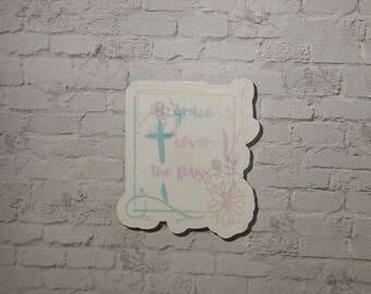 Let Grace Cover The Flaws : christian stickers; singles or bulk; available in clear, vinyl, & thick paper varieties