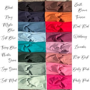 May include: A collection of colorful headbands in various shades, including black, navy, and soft mint. Each headband is twisted at the front. The image also displays the names of the colors: Black, Navy, Mystic Blue, Soft Blue, Tropics Blue, Hunter Green, Sage Green, Soft Mint, Earth Brown, Turmeric, Real Red, Wildberry, Lavender, Rose Dust, Dolly Pink, and Party Pink.