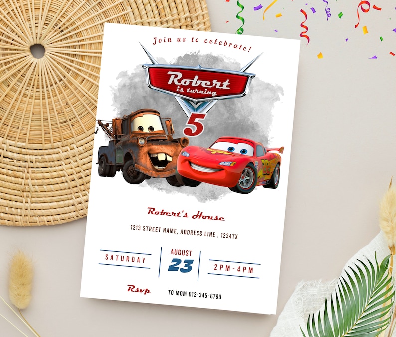 May include: A white invitation card featuring the animated characters Mater and Lightning McQueen from the movie Cars. The card reads "Join us to celebrate! Robert is turning 5" and includes event details like date, time, and RSVP information.