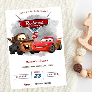 May include: A birthday party invitation featuring the characters Mater and Lightning McQueen from the movie Cars. The invitation reads "Robert is turning 5" and includes event details. The design is set against a white background.
