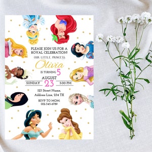 May include: A white invitation with gold stars and a pink and gold banner. The invitation is for a princess-themed birthday party for Olivia, who is turning 5. The invitation features images of Disney princesses, including Cinderella, Ariel, Belle, Snow White, and Jasmine.