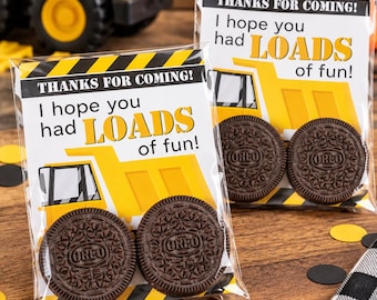 May include: Two clear plastic favor bags each containing two round chocolate sandwich cookies. The bags feature a yellow construction truck graphic, black and yellow caution stripes, and the text: THANKS FOR COMING! I hope you had LOADS of fun!