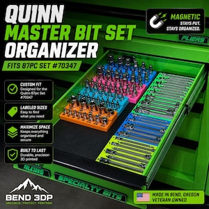 May include: A Quinn Master Bit Set Organizer for an 87-piece set #70347, featuring colourful 3D-printed trays in blue, pink, orange, and lime green. The magnetic trays hold various metal bits and extensions, organised inside a green tool drawer.