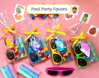 May include: Pool Party Favors. Clear cellophane bags tied with yellow ribbons, each containing sunglasses, a pop-it toy, and colorful small toys. Additional stickers and pink sunglasses are also visible. The background is pink.