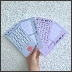 Może przedstawiać: Cztery kolorowe, drukowalne wykresy z tekstem "Notgroschen Sparchallenge" i świnką skarbonką z tekstem "300 €". Wykresy zostały zaprojektowane, aby pomóc ludziom oszczędzać pieniądze.