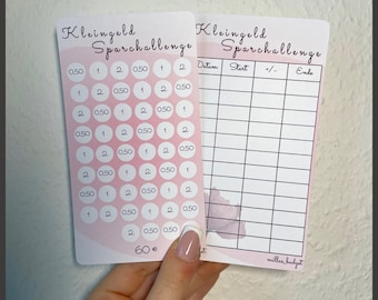 May include: Two pink and white cards with the text "Kleingeld Sparchallenge" on them. The left card has a grid of circles with numbers and the text "60 €". The right card has a table with the headings "Datum", "Start", "+" and "-", "Ende", and "millas budget".