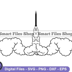 May include: Black and white graphic of a rocket launching into space, with large clouds of smoke billowing out from the base. The text "Smart Files Shop" is displayed above the rocket. The bottom of the image includes the text "Digital Files - SVG - PNG - DXF - EPS".
