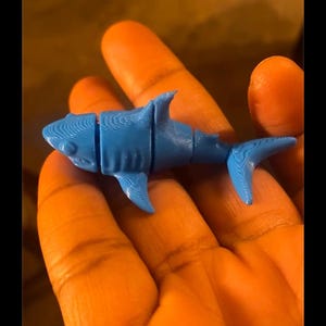 Flexi shark toy inside the bath bomb