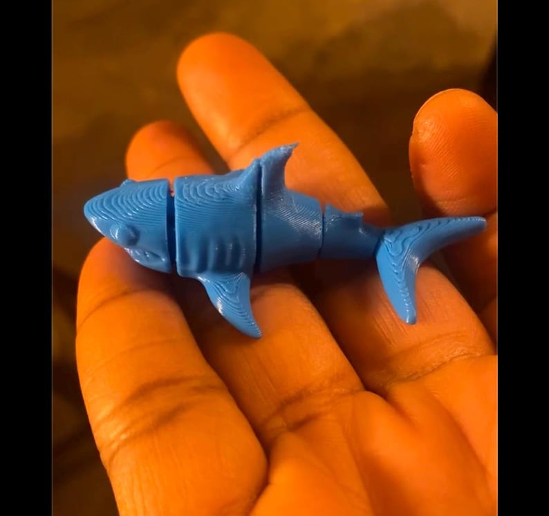Flexi shark toy inside the bath bomb
