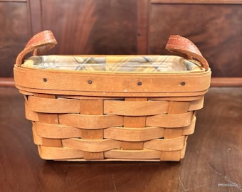 Cesta de té pequeña Longaberger 2003 con forro protector y asas de cuero (EE. UU.)