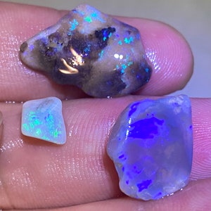 Ópalos de cristal ásperos y frotados de Lightning Ridge NSW