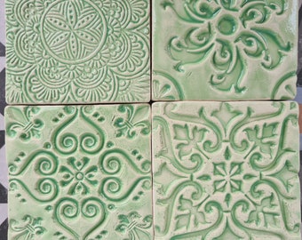 Set of 4 green ceramic tiles