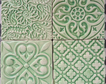 Set of 4 green ceramic tiles