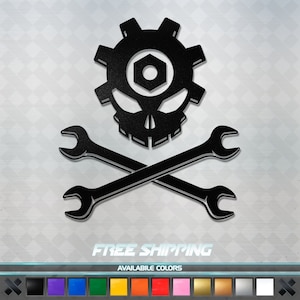 May include: Black and white decal of a skull with a gear for a head and crossed wrenches. The decal says "FREE SHIPPING" and "AVAILABLE COLORS" at the bottom.