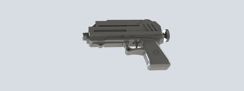 K&ouml;nnte beinhalten: Eine graue, futuristisch aussehende Pistole mit rechteckigem K&ouml;rper und abgerundetem Griff. Die Waffe hat einen Abzug, ein Visier und einen Knopf auf der R&uuml;ckseite. Das Design ist schlank und modern, mit metallischem Aussehen.