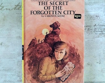 1975 El secreto de la ciudad olvidada, Historias de misterio de Nancy Drew n.° 52, Carolyn Keene