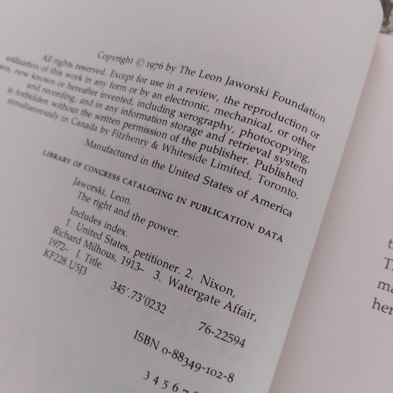 May include: A white book page featuring black printed text including the copyright notice from 1976 by The Leon Jaworski Foundation, Library of Congress cataloging data for the book The Right and the Power, and the ISBN number 0-88349-102-8.