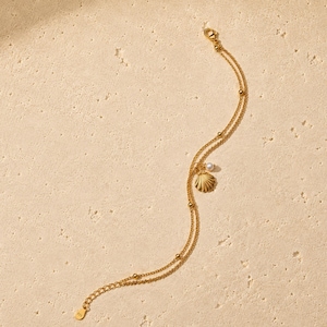 Snäckskal-fotlänk i guld och sterlingsilver, läckra, kustinspirerade smycken