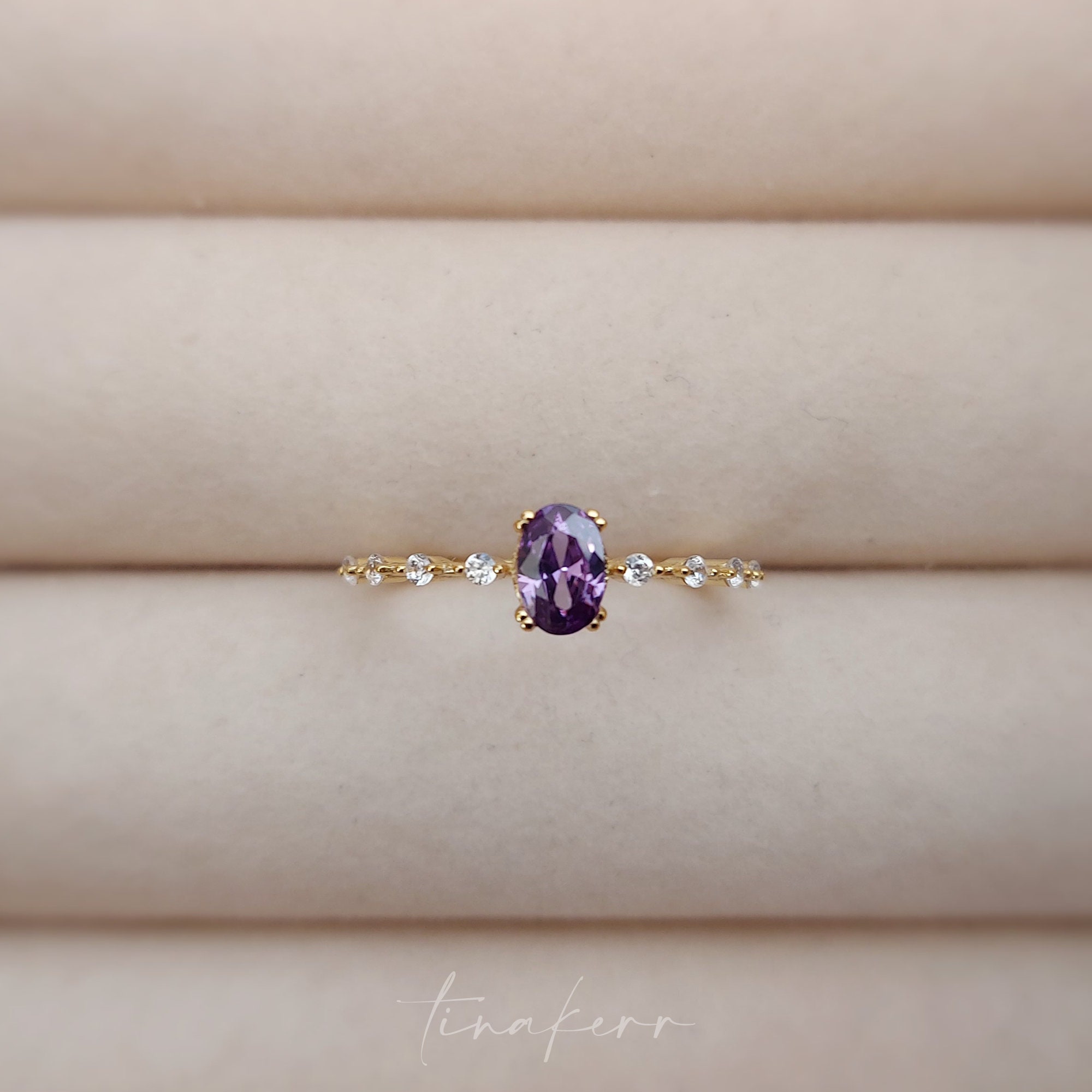Purple oval show me ring size 6
