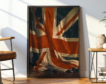 May include: A framed vertical wall art print featuring a realistic depiction of a draped Union Jack flag. The fabric displays deep red, white, and dark blue tones with soft folds and shadows, creating a textured appearance within a thin black frame.