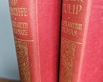 Par de novelas literarias antiguas de tapa roja de Collins