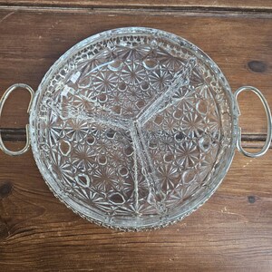 Vintage Ornate pressed glass divided dish in n a silver plated tray