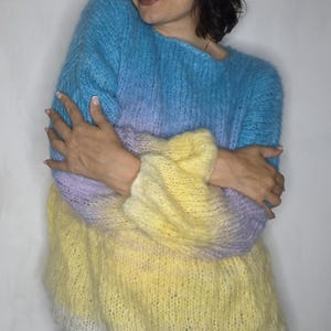 Soft bright handmade sweater with color transitions, warm voluminous sweater for women