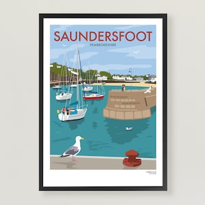 May include: A colourful illustration of a harbour scene in Saundersfoot, Pembrokeshire, Wales. The image features a variety of boats docked in the harbour, a seagull perched on a pier, and a red buoy. The text "Saundersfoot" and "Pembrokeshire" is displayed at the top of the image.