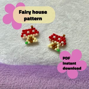 May include: Two beaded mushroom figures with red and white caps, tan stems, and green bases. The text "Fairy house pattern" and "PDF instant download" are displayed on the image, which is set against a white and purple background.
