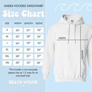 May include: Size chart for a unisex hooded sweatshirt. The chart shows the width, length, and sleeve length in inches for sizes S, M, L, XL, 2XL, and 3XL. The text *This hoodie is not oversized, please size up 1-2 sizes for an oversized look* is below the chart. The text BEACH HOUSE CO. is at the bottom of the chart.