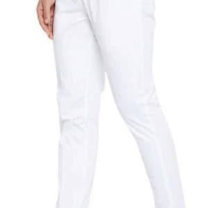 May include: White trousers with an elastic waistband and a single front pocket. The trousers are being worn by a person wearing brown sandals.