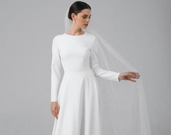 Simple modest wedding dress with long sleeves made of crepe | Elina