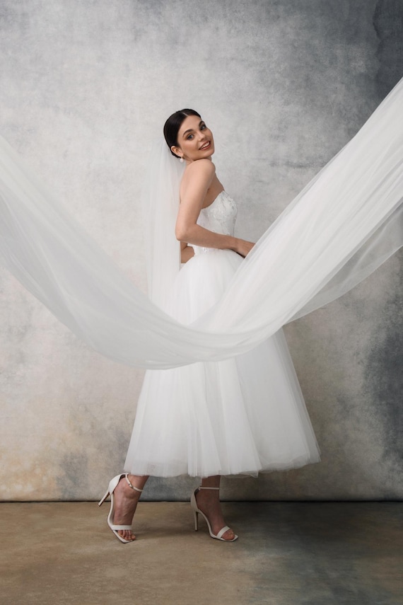 strapless tea length wedding dress KATIE-BELLE Princess Short Our tea length dress is perfect for a modern bride who likes a touch of elegance Strapless Tea Length Wedding Dress