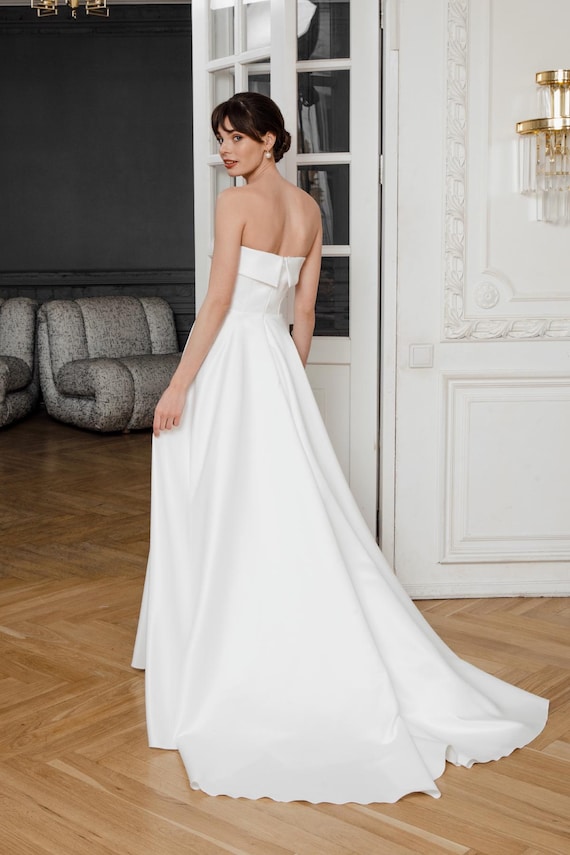 satin a line wedding dress with pockets Strapless Wedding Dress Satin With Pockets – Lisposa main image 1