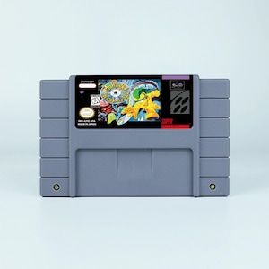 Mohawk i gniazdo słuchawkowe - do konsoli SNES - działający kartridż - region NTSC lub PAL - fantastyczny stan