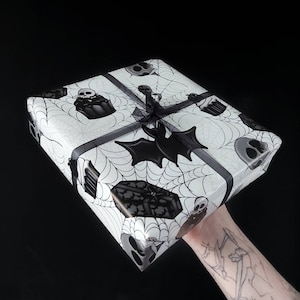 Spooky Party Grimwrap | Goth Birthday party wrapping paper rolls, Cute Halloween lover gift wrap