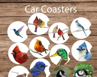 May include: White car coasters with watercolor bird illustrations. The coasters feature a variety of birds, including cardinals, blue jays, and hummingbirds. The text "Bird Car Coasters" is displayed at the top of the image.