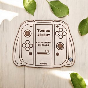 Annoncement manette nintendo switch en bois demande de parrain « Niveau parrain débloqué,Acceptes-tu ta nouvelle mission »souvenir grossesse