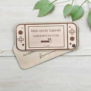 Annoncement console nintendo switch en bois demande de parrain « Niveau parrain débloqué,Acceptes-tu ta nouvelle mission »souvenir grossesse